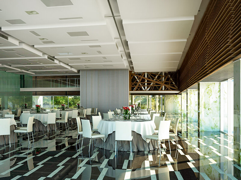 Un salón de banquetes moderno con mesas redondas, sillas blancas, pisos brillantes con patrones y paneles de techo geométricos.