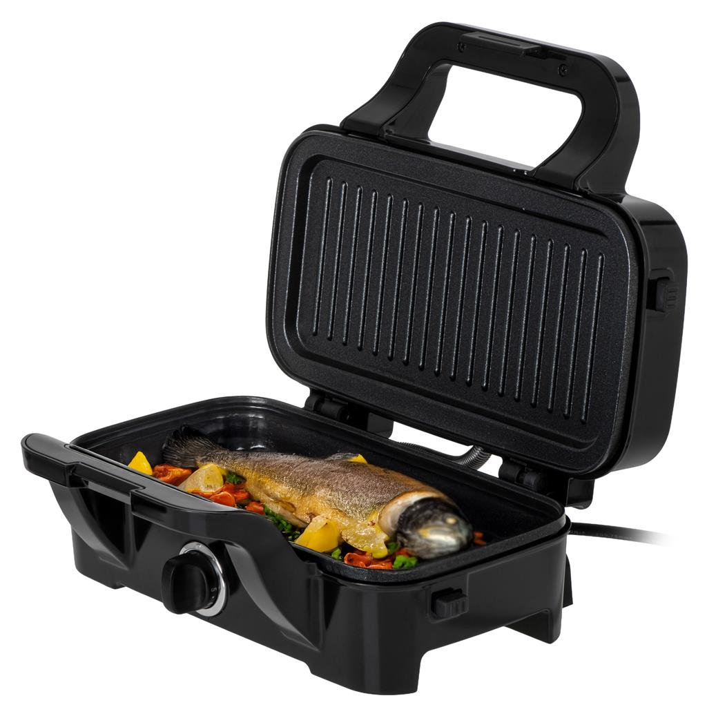 Czarny grill elektryczny otwarto na białym tle, w środku cała ugotowana ryba z warzywami.
