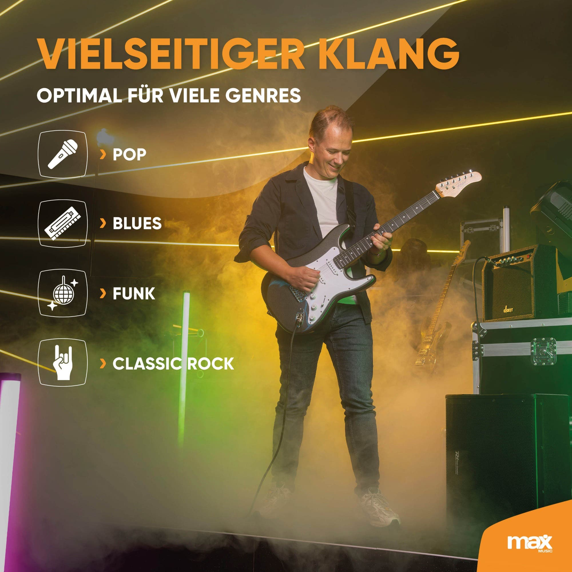 Ein Gitarrist spielt E-Gitarre auf einer Bühne mit Nebel und Lichtern.
