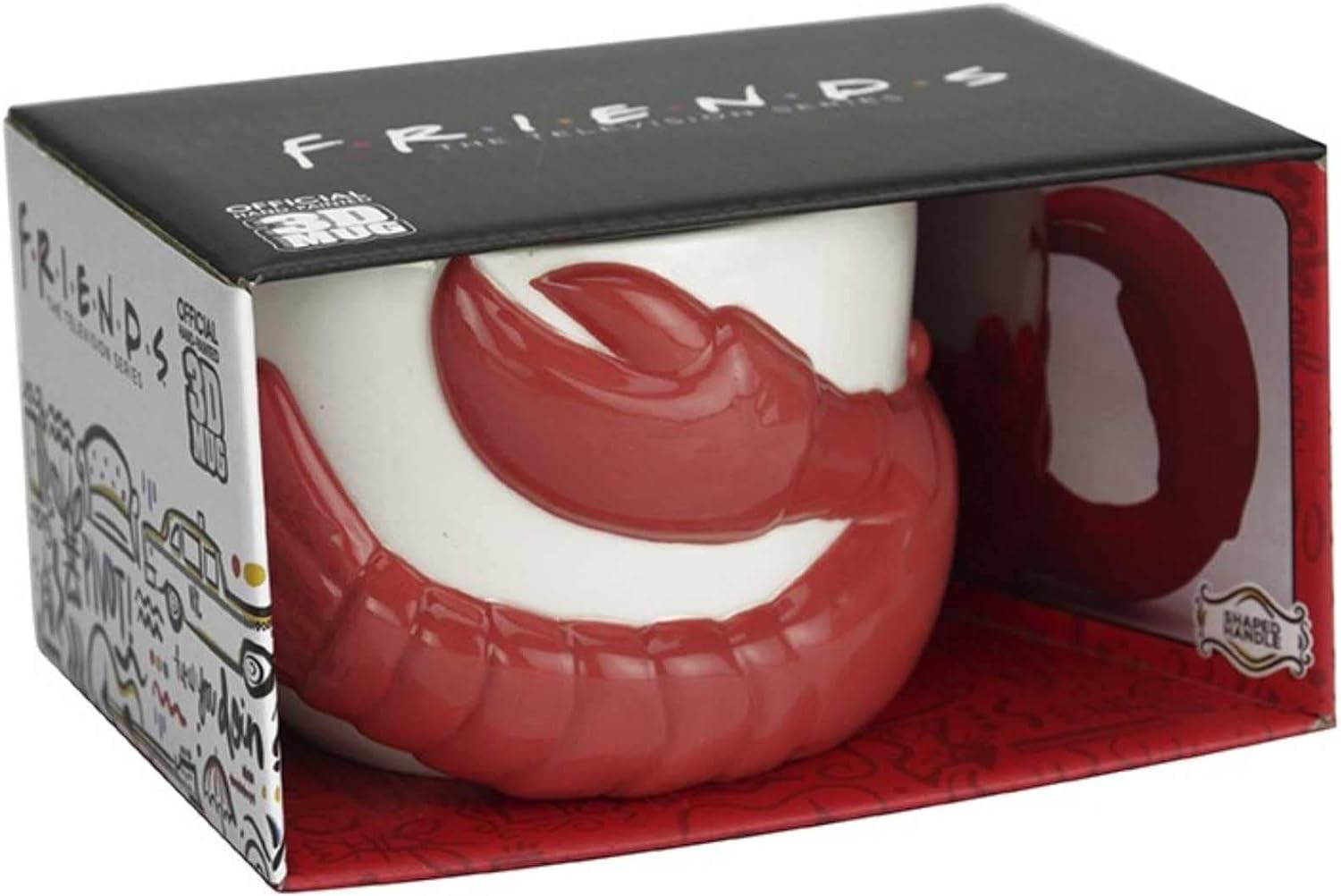 Una taza blanca de Friends con una langosta roja esculpida, dentro de una caja de regalo.