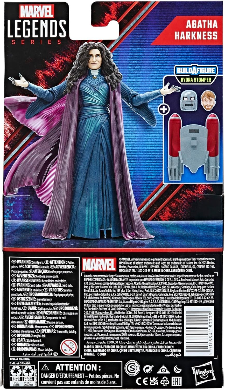 Figura de acción de Agatha Harkness de Marvel Legends con túnica morada y accesorios en su caja.