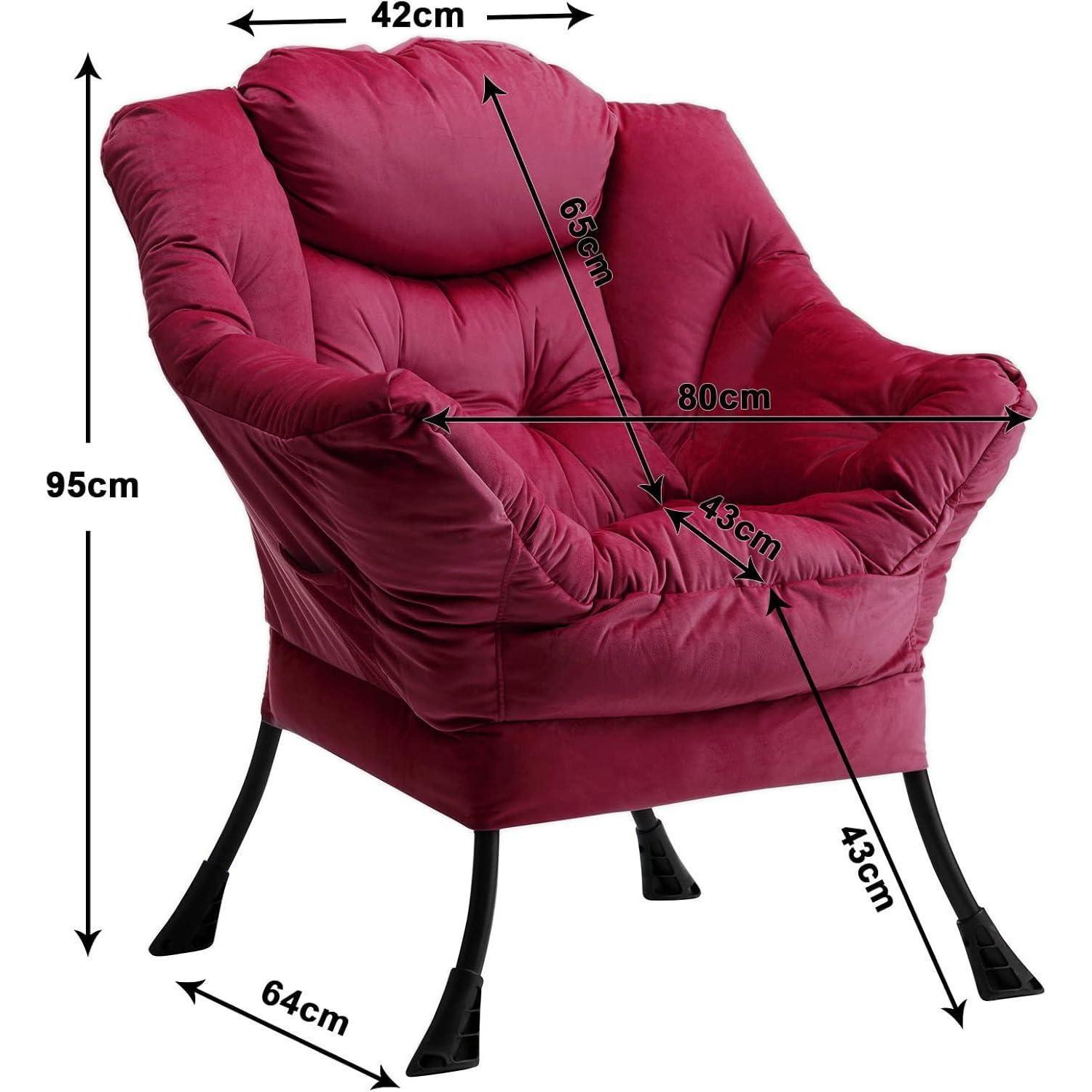 Una poltrona di peluche rosa scuro con gambe in metallo nero e misure di dimensione mostrate con frecce.