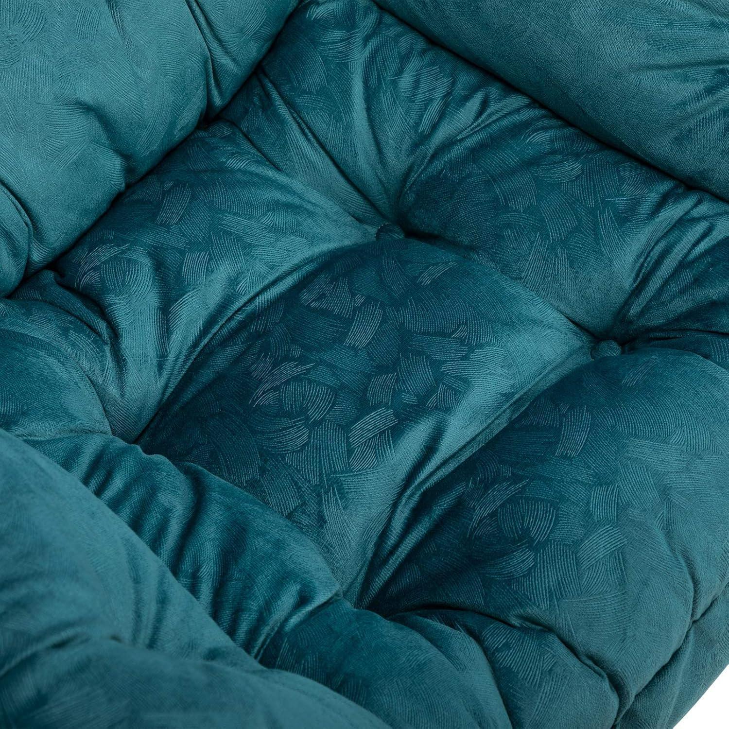 Cuscini di seduta in peluche blu scuro in tessuto di velluto fantasia e capitonné.