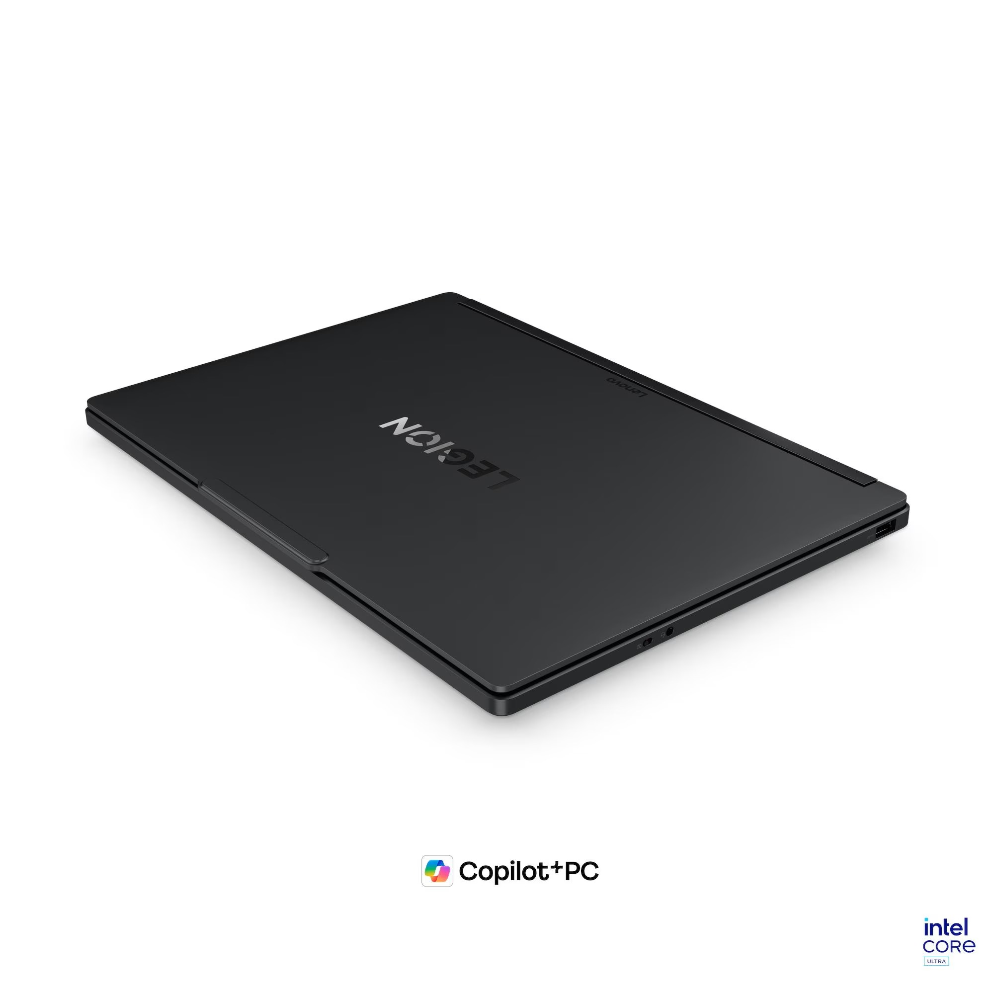 Intel Core Ultra ve Copilot+PC logolarına sahip beyaz arka planda kapalı siyah bir Lenovo Legion dizüstü bilgisayar.