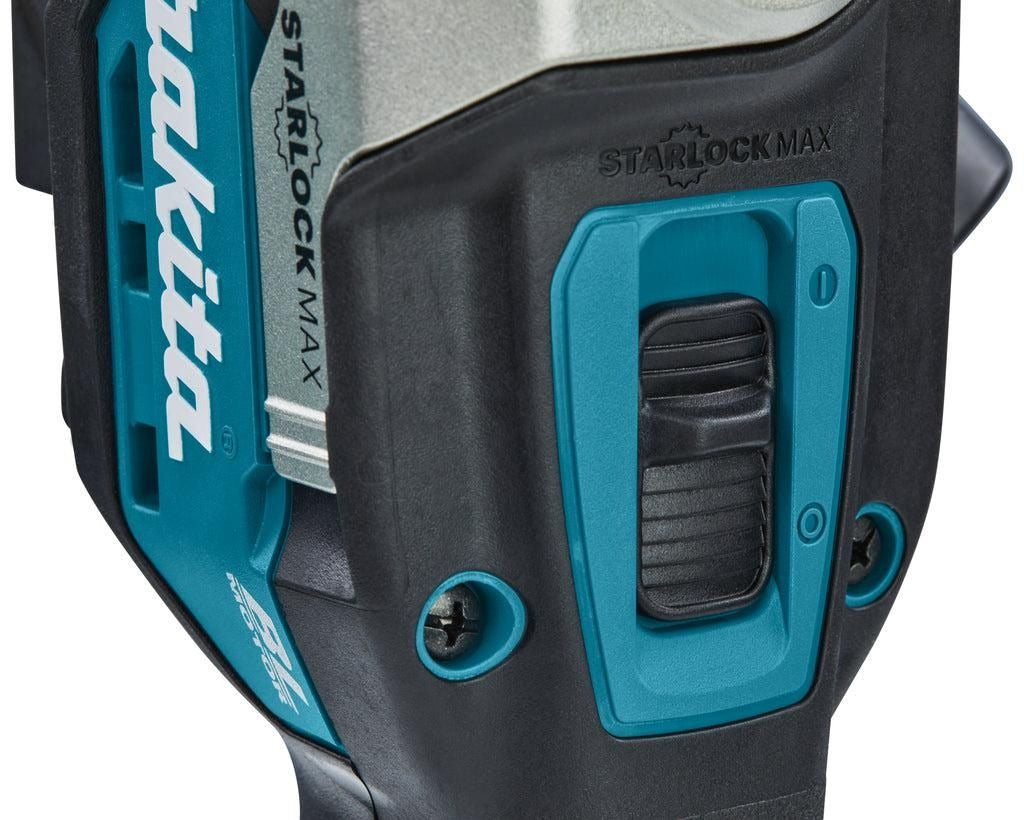 Close-up of a teal and black Makita power tool body with a Starlock Max label and black power switch.