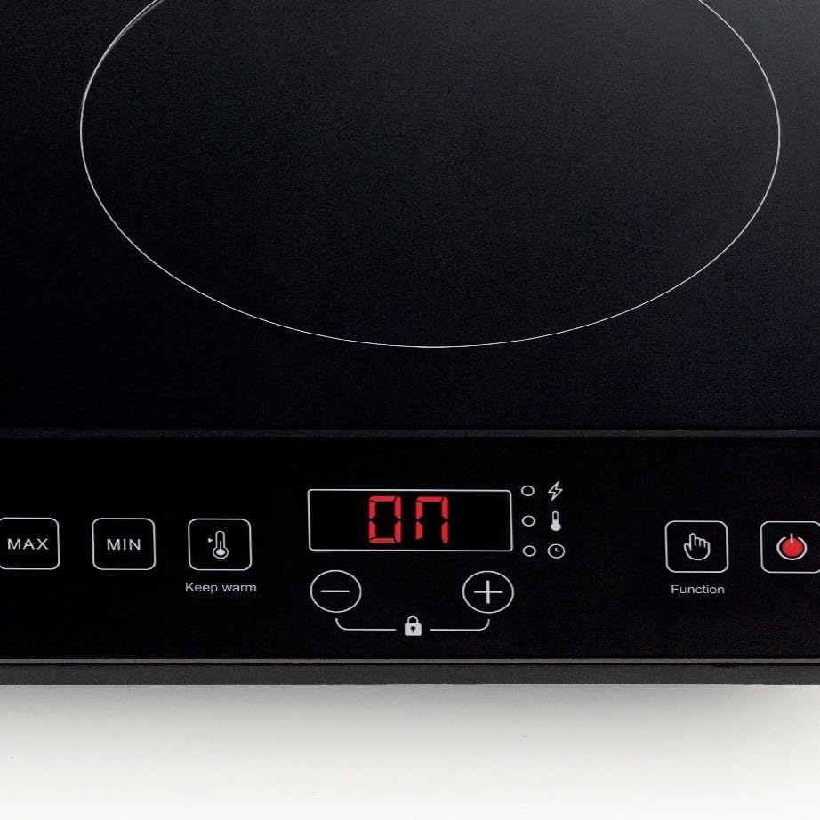 Black induction cooktop with a digital display and touch control buttons.