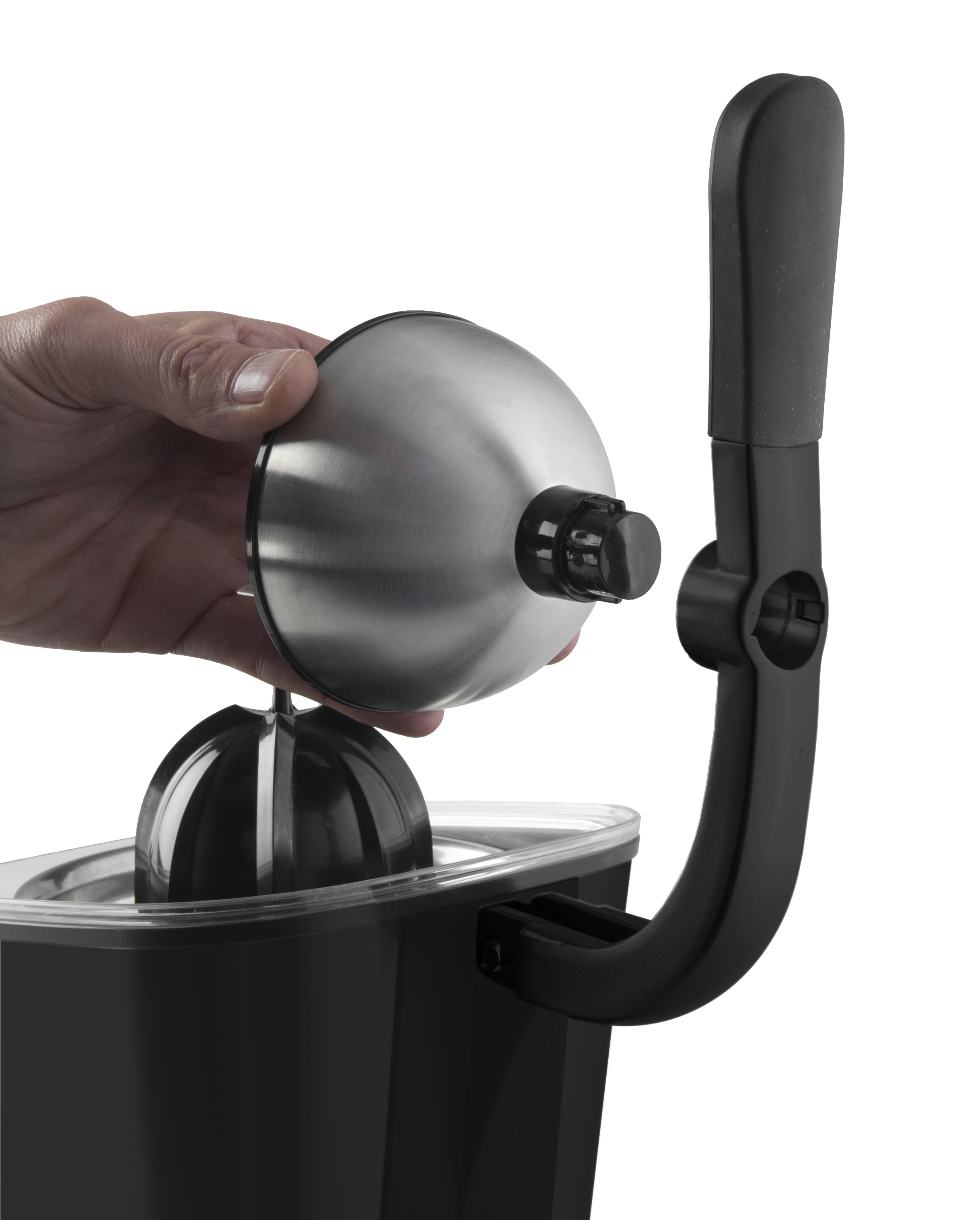 A hand places the stainless steel top onto a black citrus juicer.