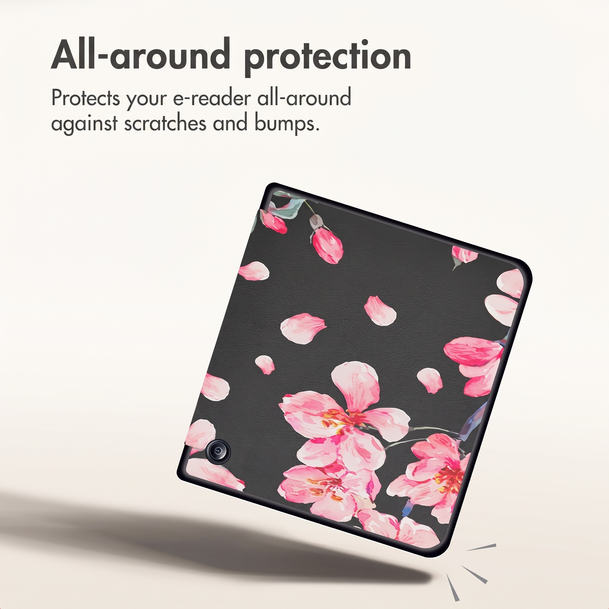 E-reader case featuring a black background with pink cherry blossom pattern.