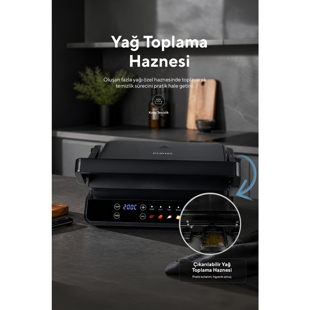 Ekranlı ve çıkarılabilir yağ toplama haznesine sahip, mutfak tezgahındaki siyah elektrikli ızgara.
