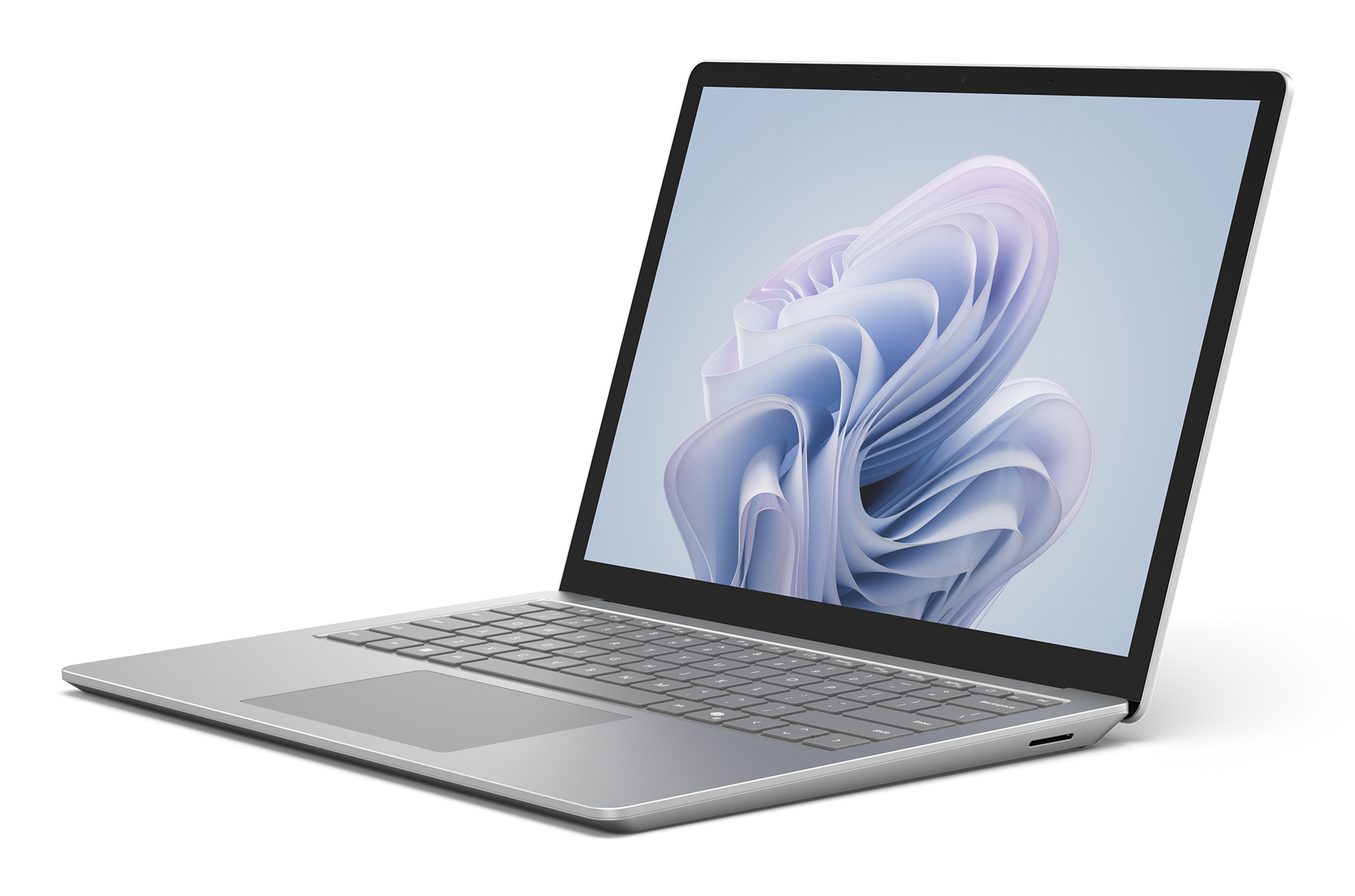 Ein silberner Laptop auf einer weißen Oberfläche mit einem weichen, violett-blauen abstrakten Wellenhintergrund.