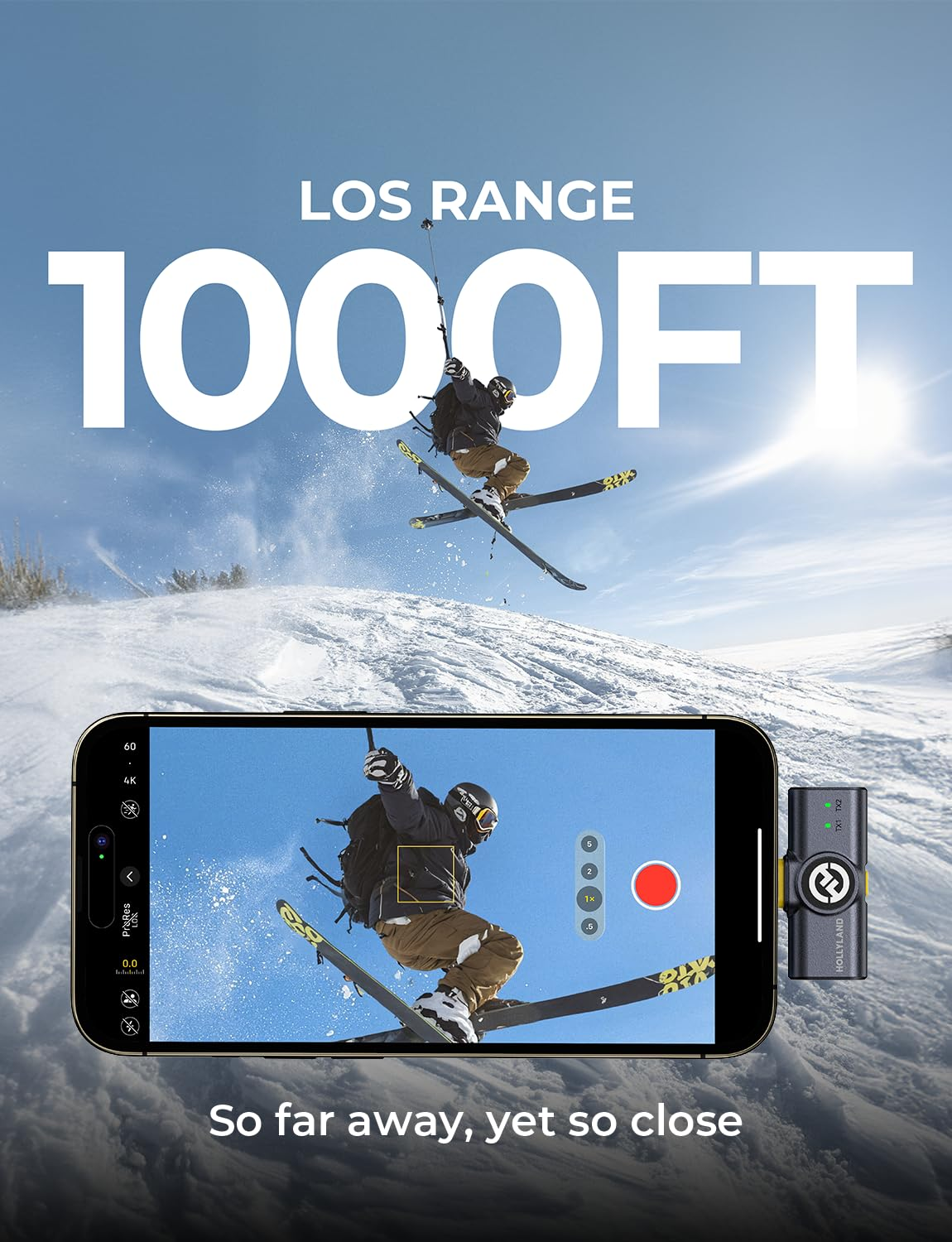 Ein Skifahrer in der Luft über einer Schneelandschaft, gefilmt mit einem Smartphone und einem kleinen Funkempfänger.