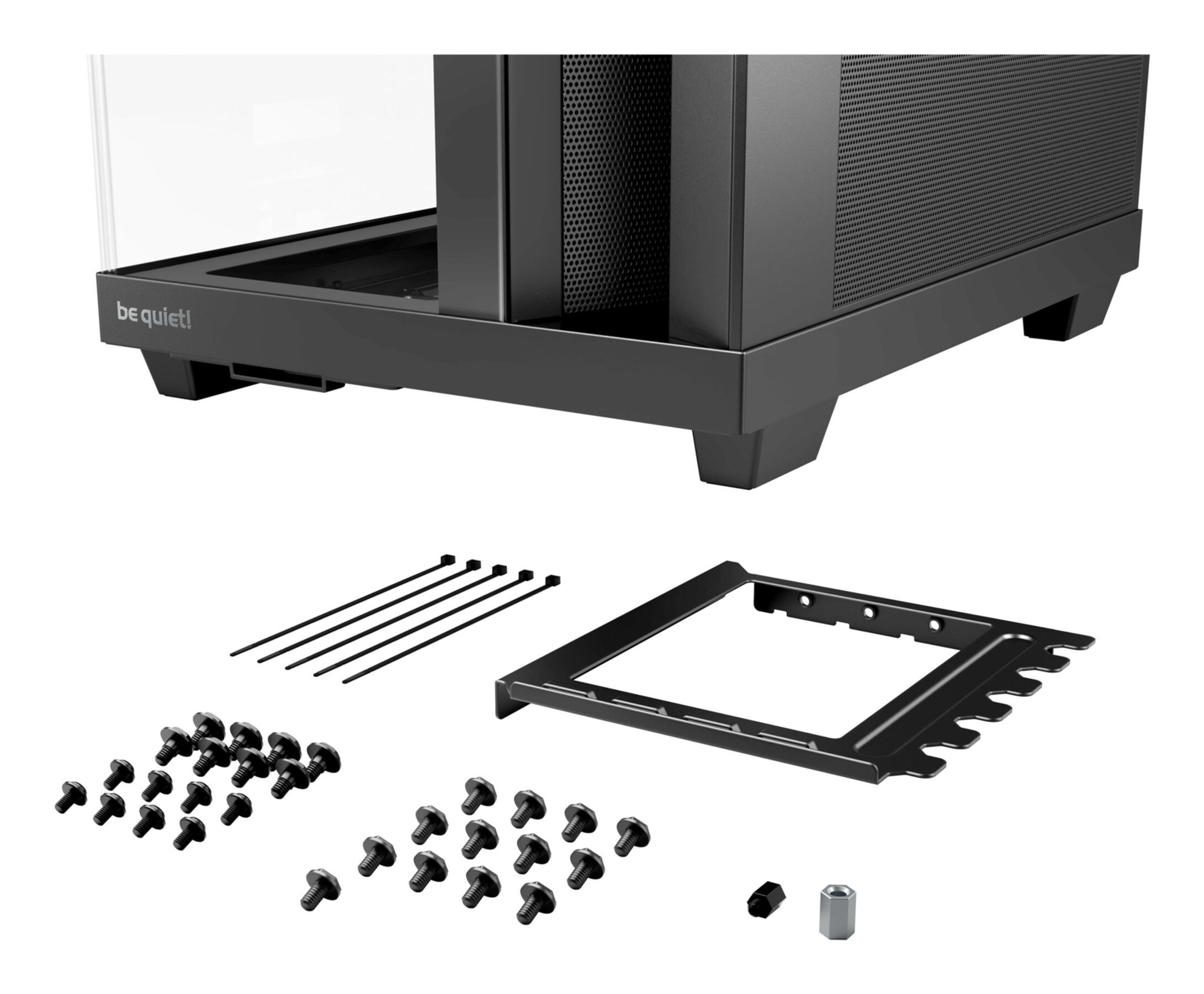 Bottom of a black PC case with included screws, zip ties, a bracket, and standoffs on a white background.