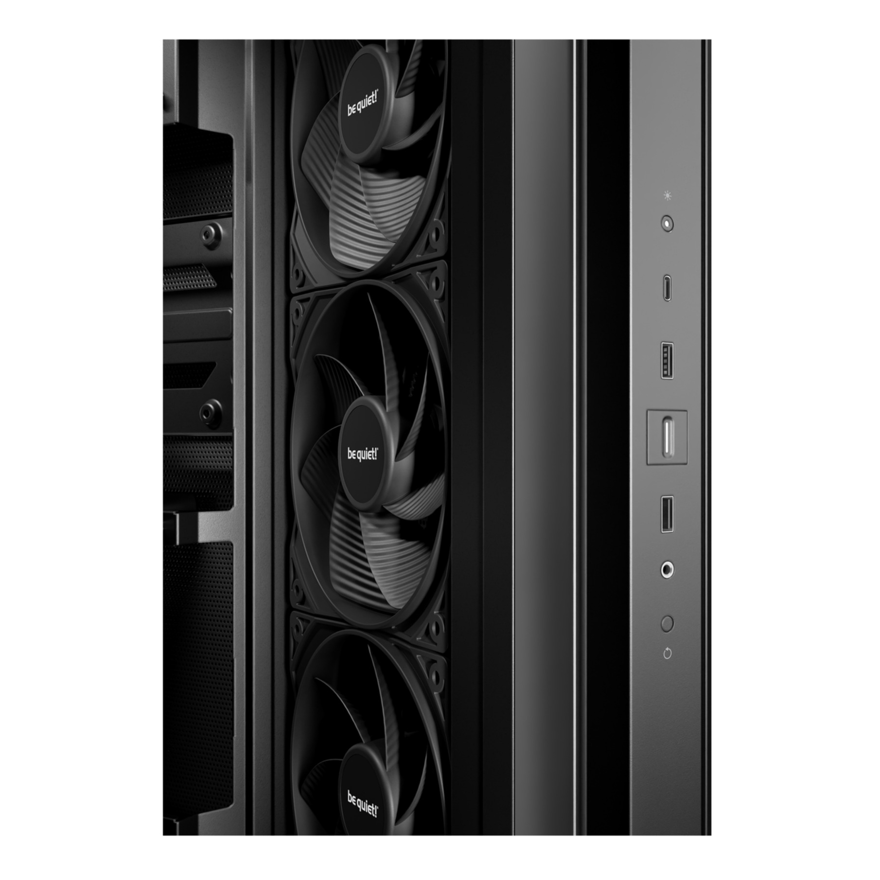 Black PC case with three front be quiet! fans and I/O ports.