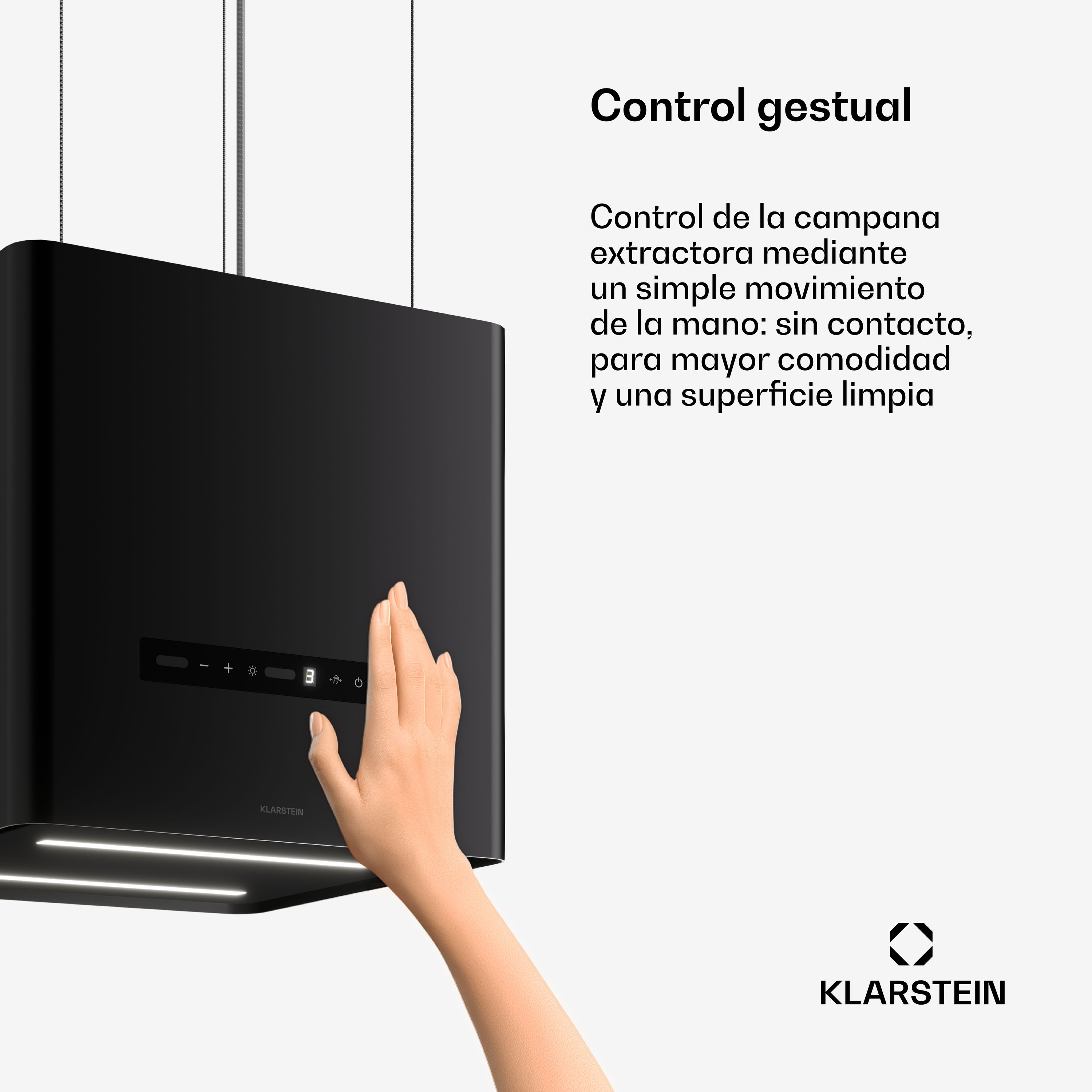Eine Hand gestikuliert an einer modernen schwarzen Dunstabzugshaube mit Touch-Steuerung.