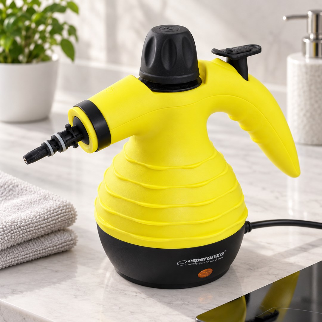Un pulitore a vapore portatile giallo e nero su un piano cucina bianco con un asciugamano e una pianta.