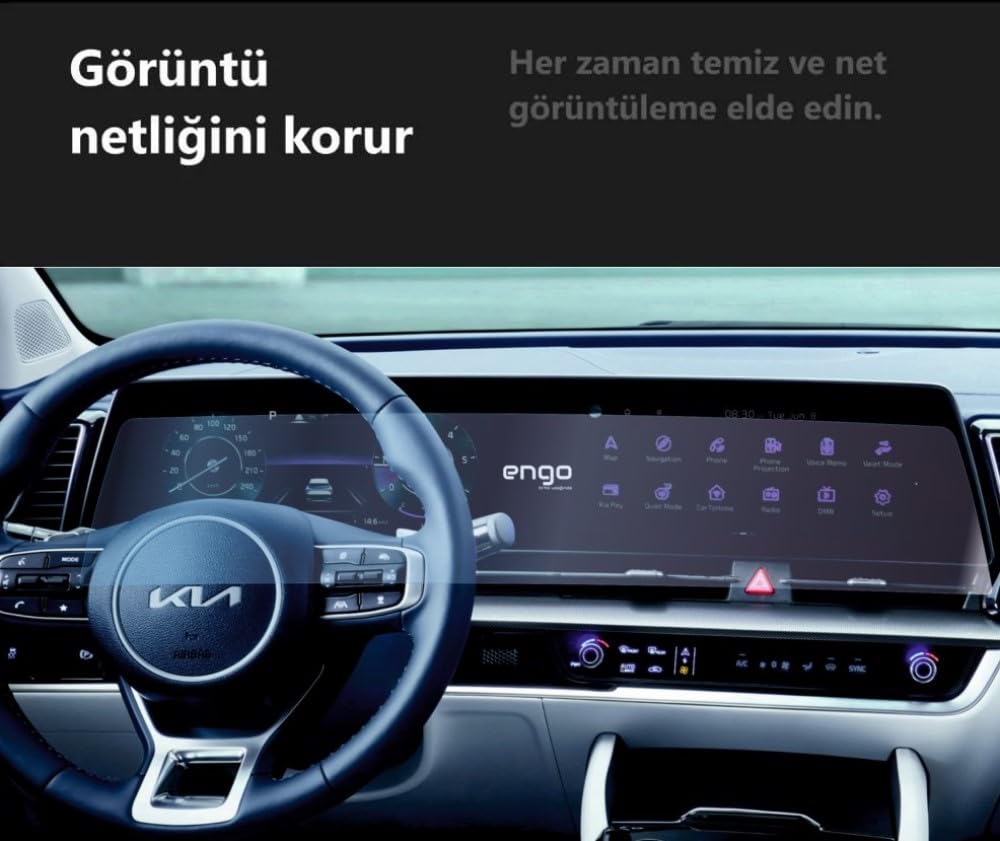 Direksiyon simidi, dijital gösterge paneli ve dokunmatik ekranı gösteren modern bir arabanın içi.