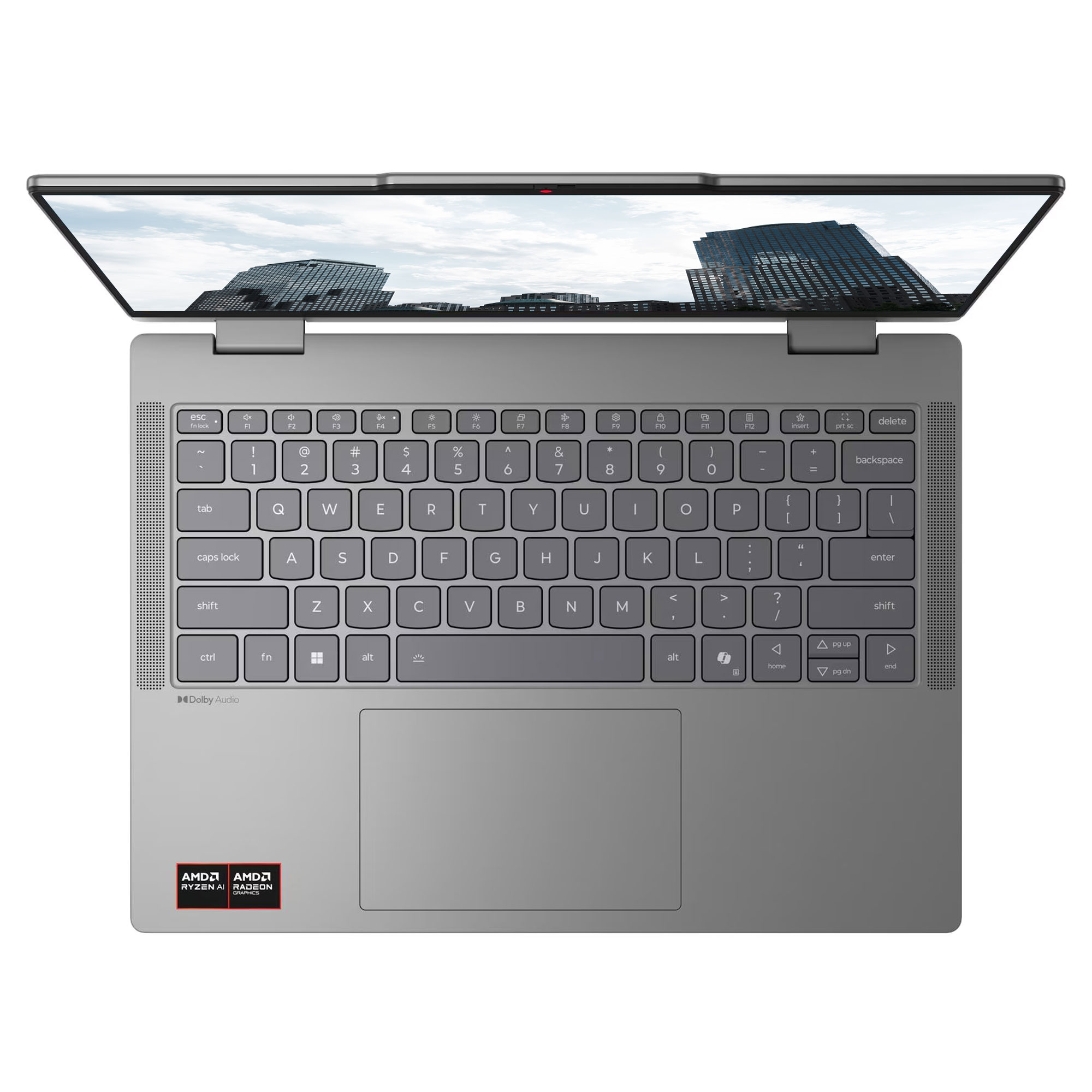 Beyaz arka planda klavye, izleme dörtgeni, Dolby Audio ve AMD etiketleri bulunan gri dizüstü bilgisayarın üstten görünümü.