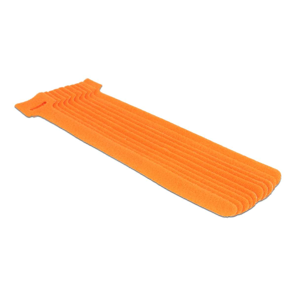 Eine Reihe orangefarbener Klettbänder auf weißem Hintergrund.