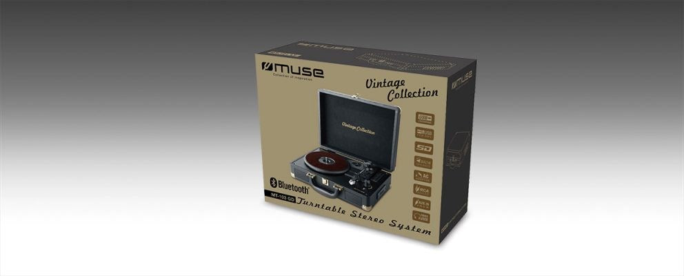 Eine beige-schwarze Produktverpackung für den Muse Vintage Bluetooth-Plattenspieler auf grauem Hintergrund.