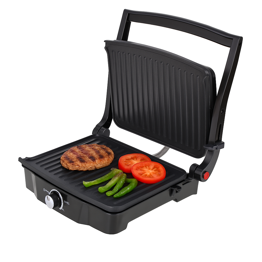 Czarny grill elektryczny z usmażonym kotletem, plastrami pomidora i zieloną papryką na żebrowanej płycie.