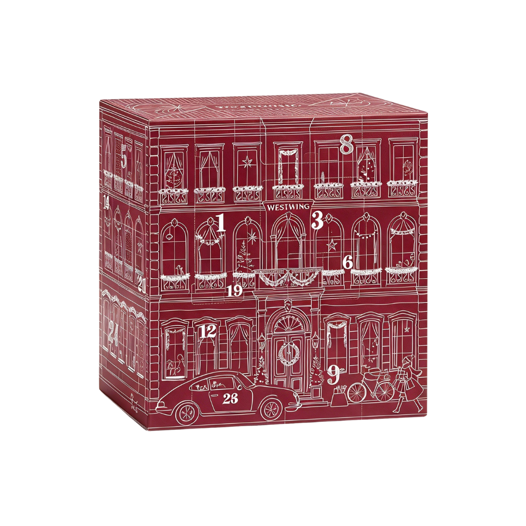 Roter, schachtelförmiger Adventskalender mit weißem Strichzeichnen eines festlichen Stadthauses mit Fenstern und Zahlen.