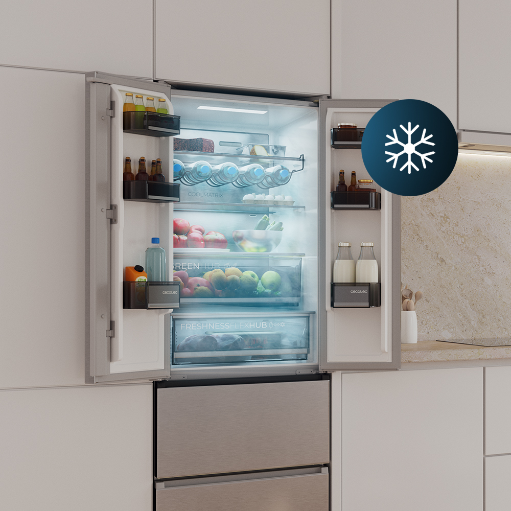 Un frigorífico empotrado abierto con alimentos y un icono de copo de nieve en la puerta.