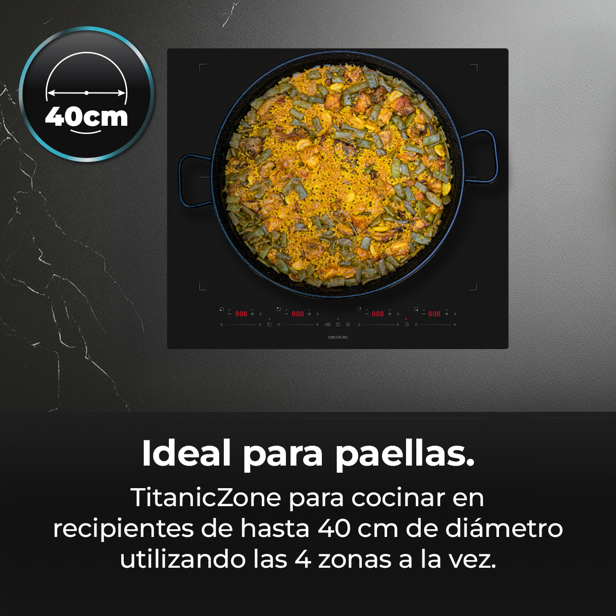 Una gran paella con arroz y judías se cocina en una placa de inducción moderna con zona de 40 cm.