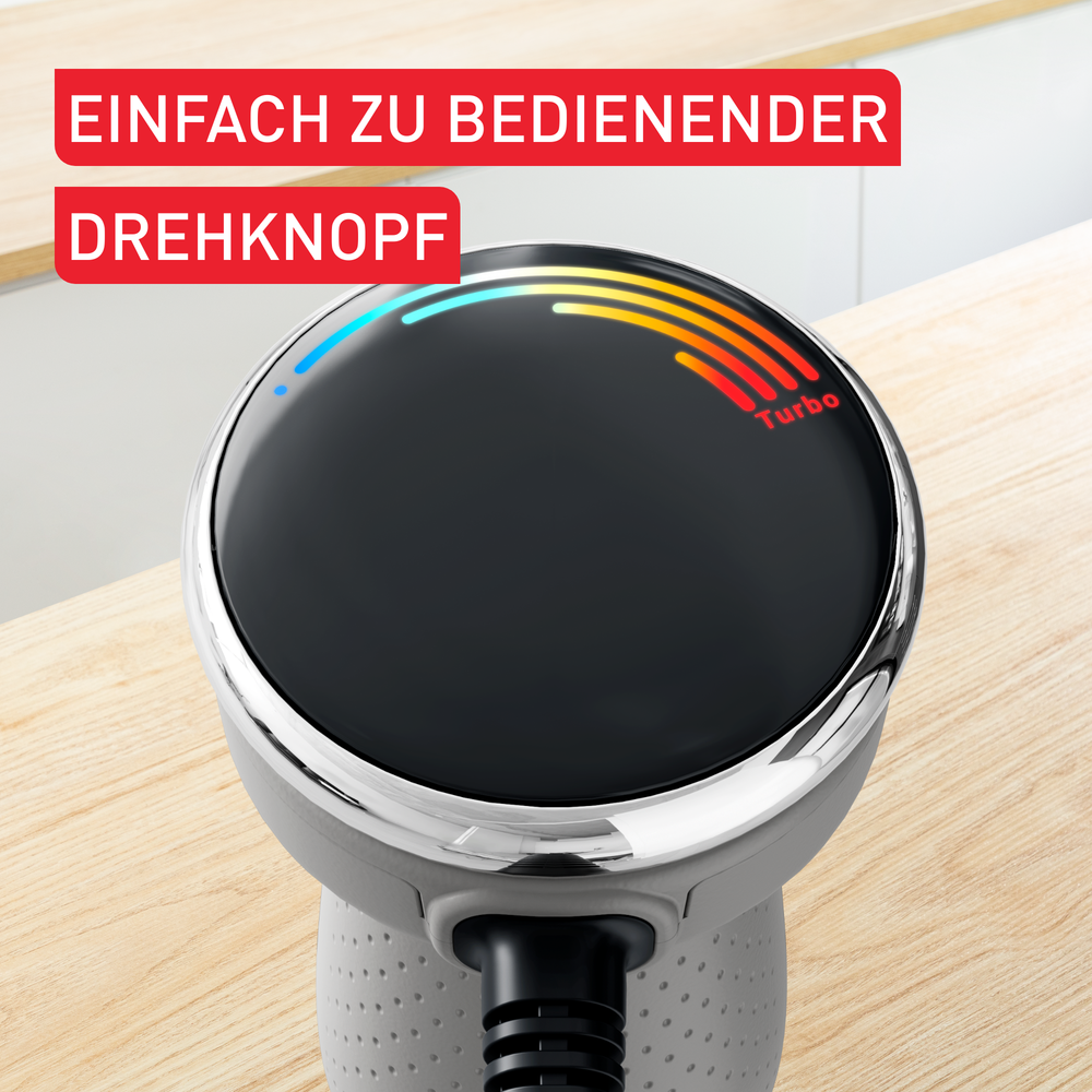 Nahaufnahme der Oberseite eines Küchengeräts mit rundem Drehknopf und bunter Geschwindigkeitsanzeige.
