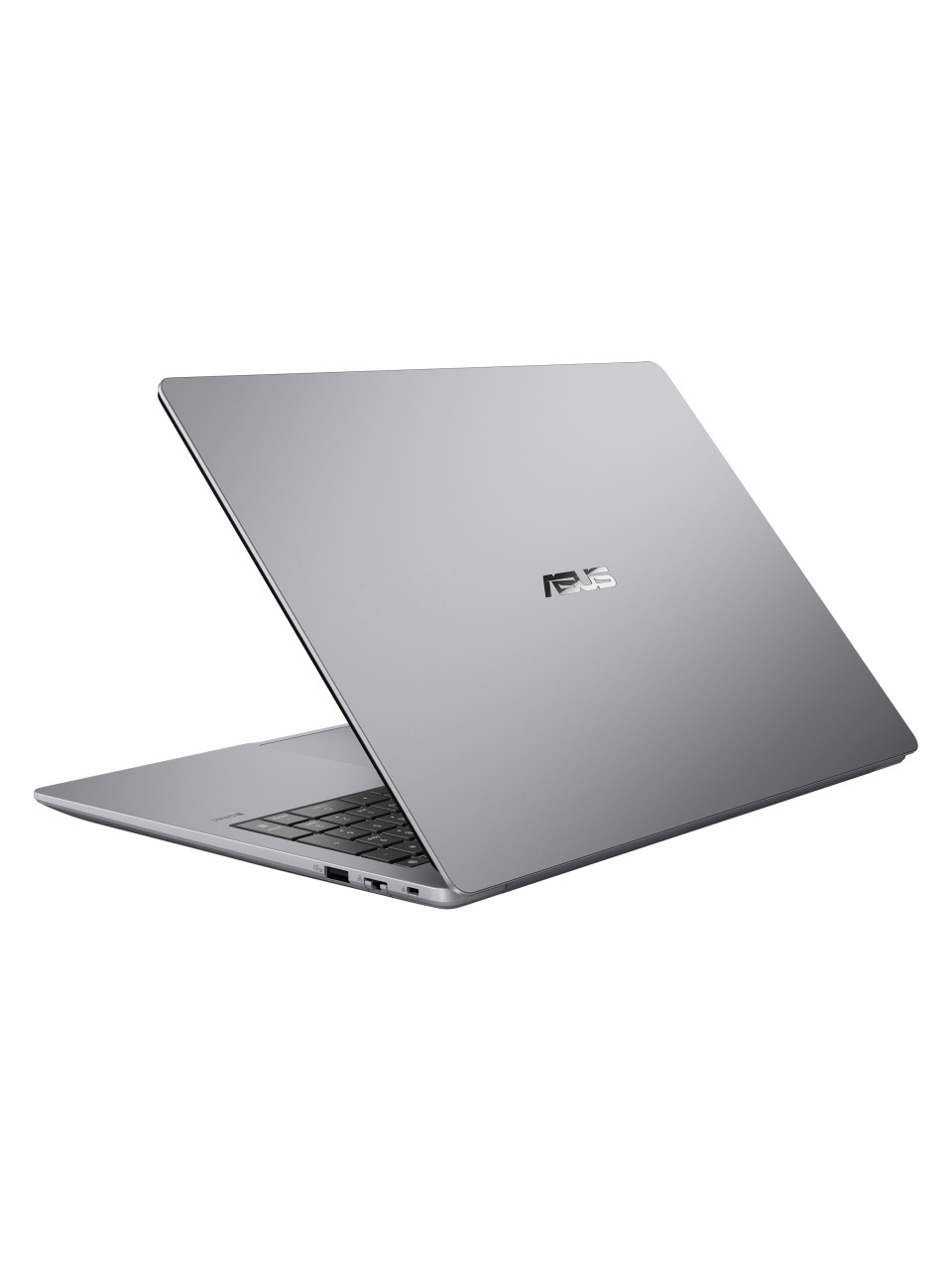 Beyaz bir zemin üzerinde gümüş renkli ASUS dizüstü bilgisayar, kapalı kapağı ve logosu görünüyor.