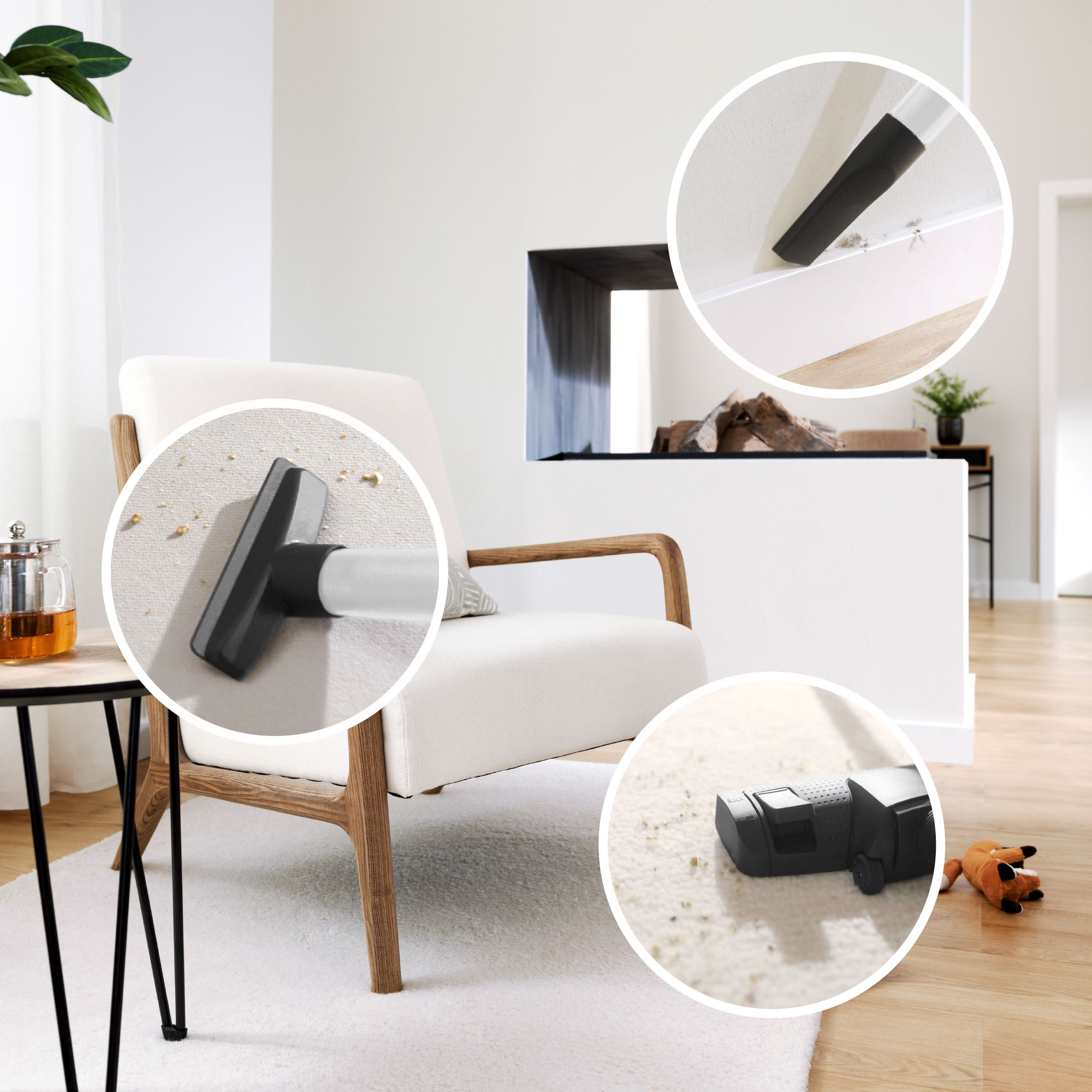 A white armchair in a living room with three circular inserts showing vacuum cleaner attachments.