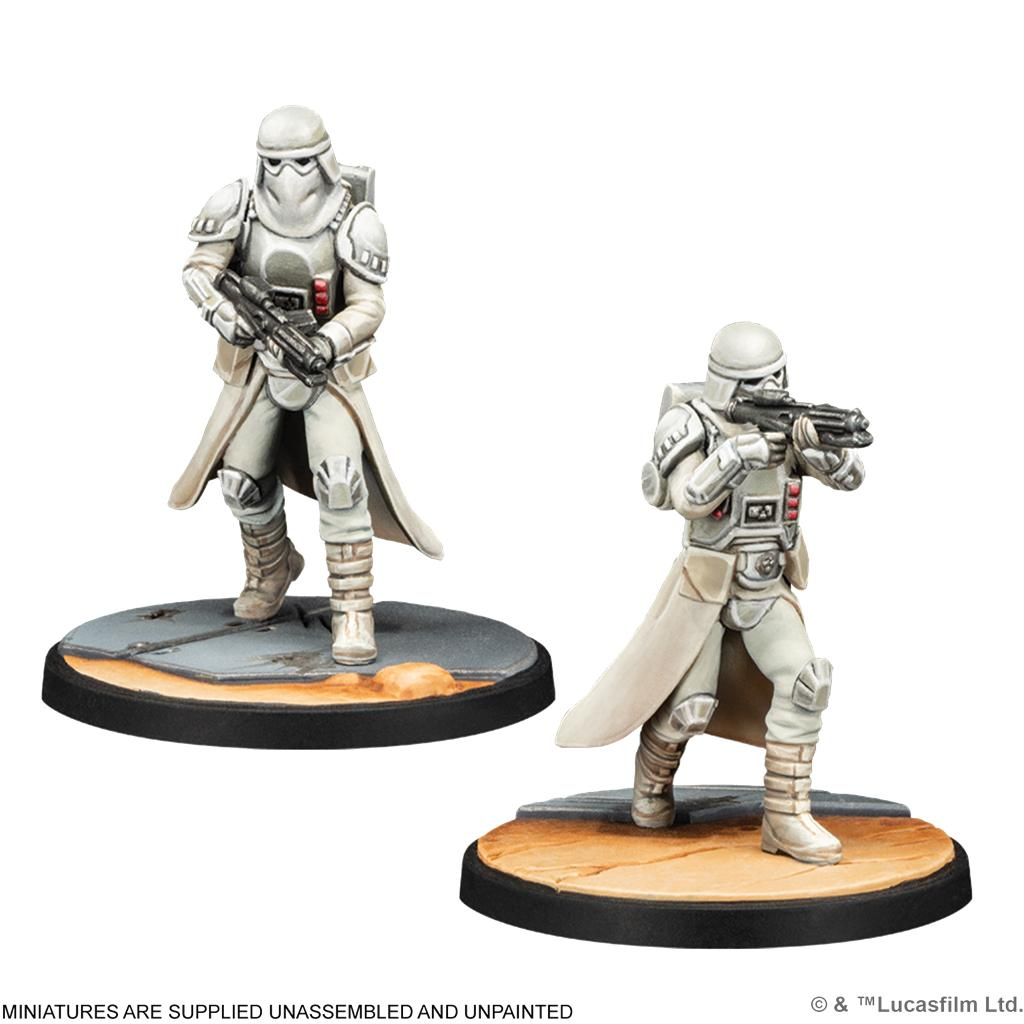 Dos miniaturas pintadas de Soldados de Asalto de las Nieves Imperiales con blásters en bases redondas.