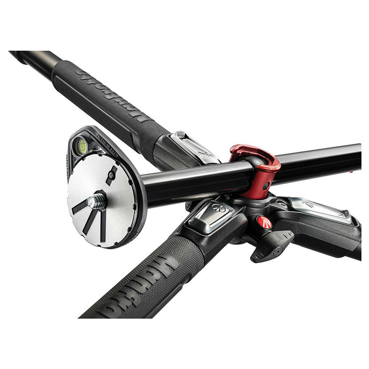 Close-up of a black camera tripod featuring a red column lock and a silver mounting plate.