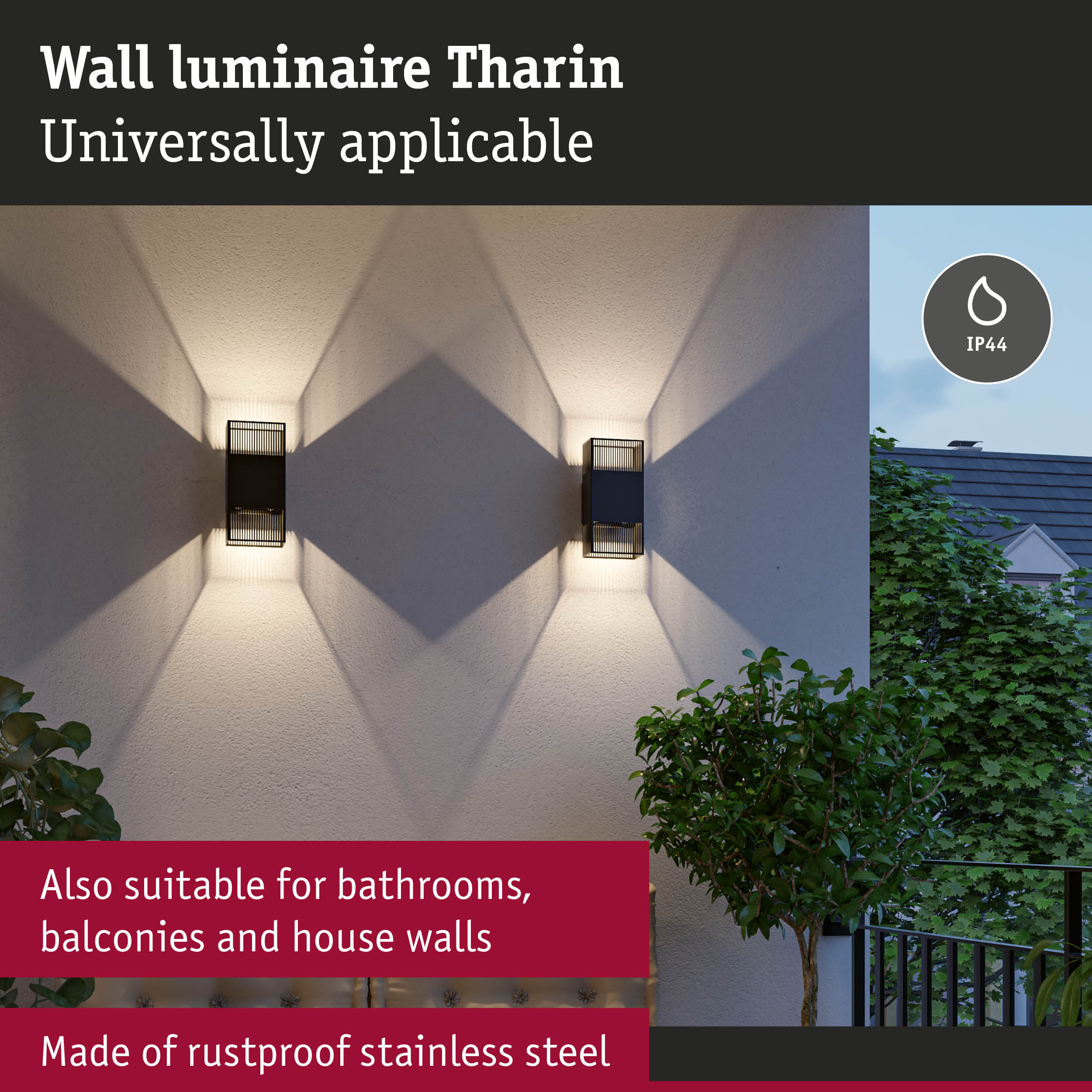 Zwei schwarze Wandleuchten an einer Außenwand strahlen Licht nach oben und unten ab.