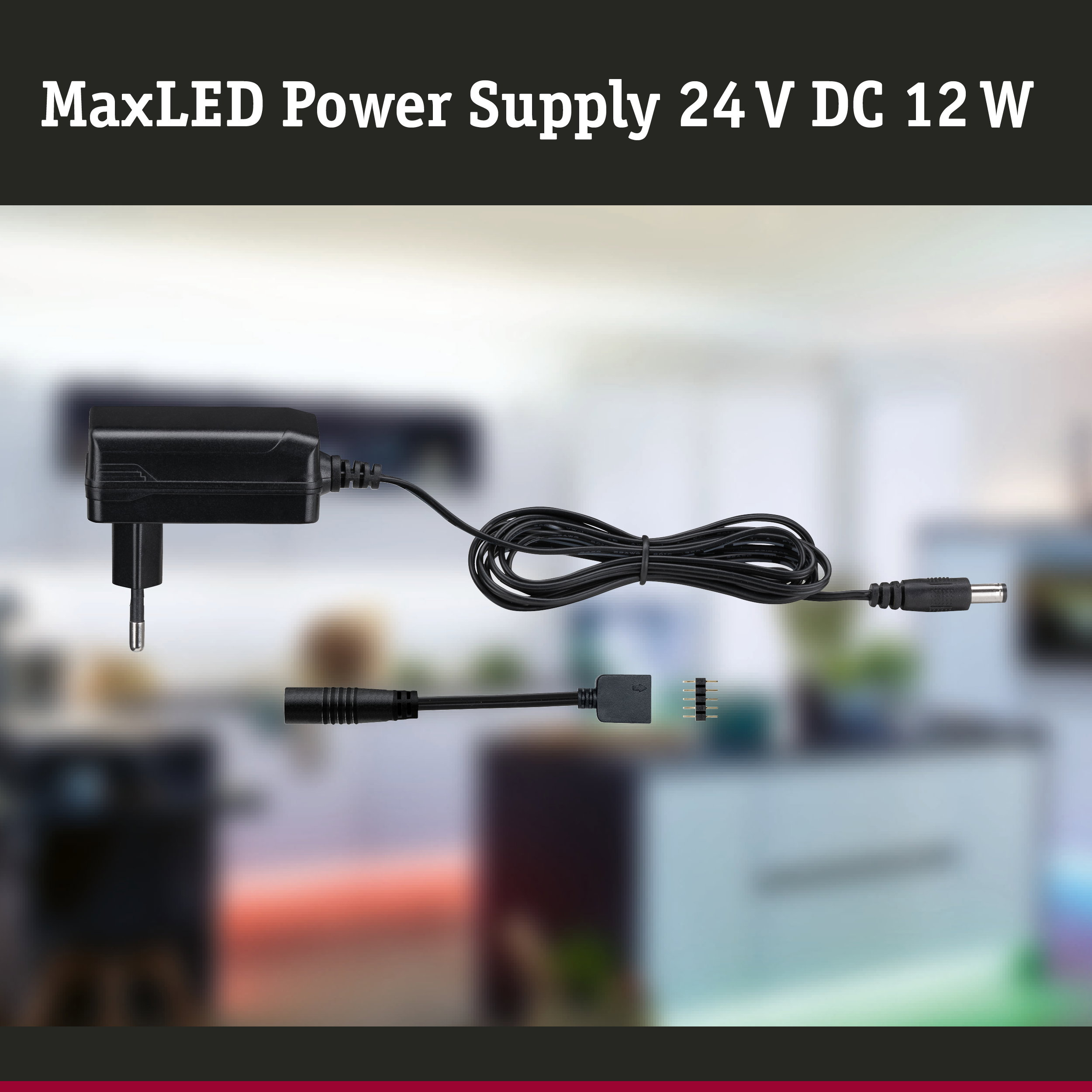 MaxLED-Netzteil 24V DC 12W mit Stecker, Kabel und Zubehör vor unscharfem Hintergrund.