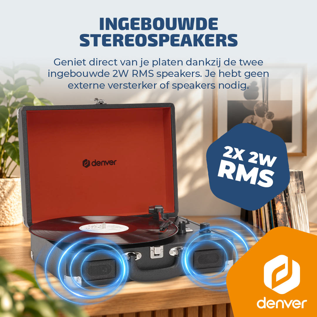 Een zwarte, draagbare koffergrammofoon met ingebouwde luidsprekers op een houten tafel.