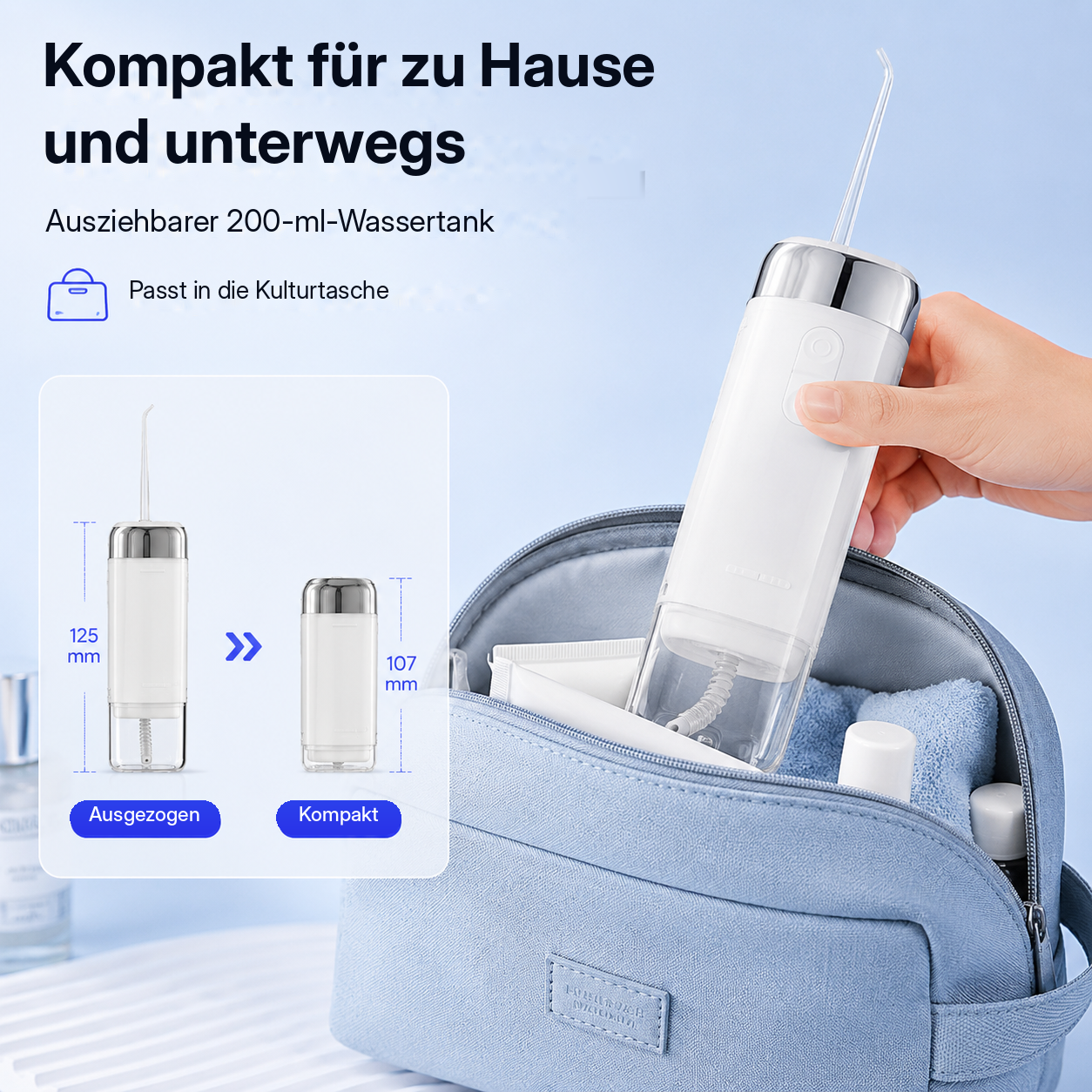 Eine handwerkt eine weiße Munddusche aus einer blauen Kulturbeutel.