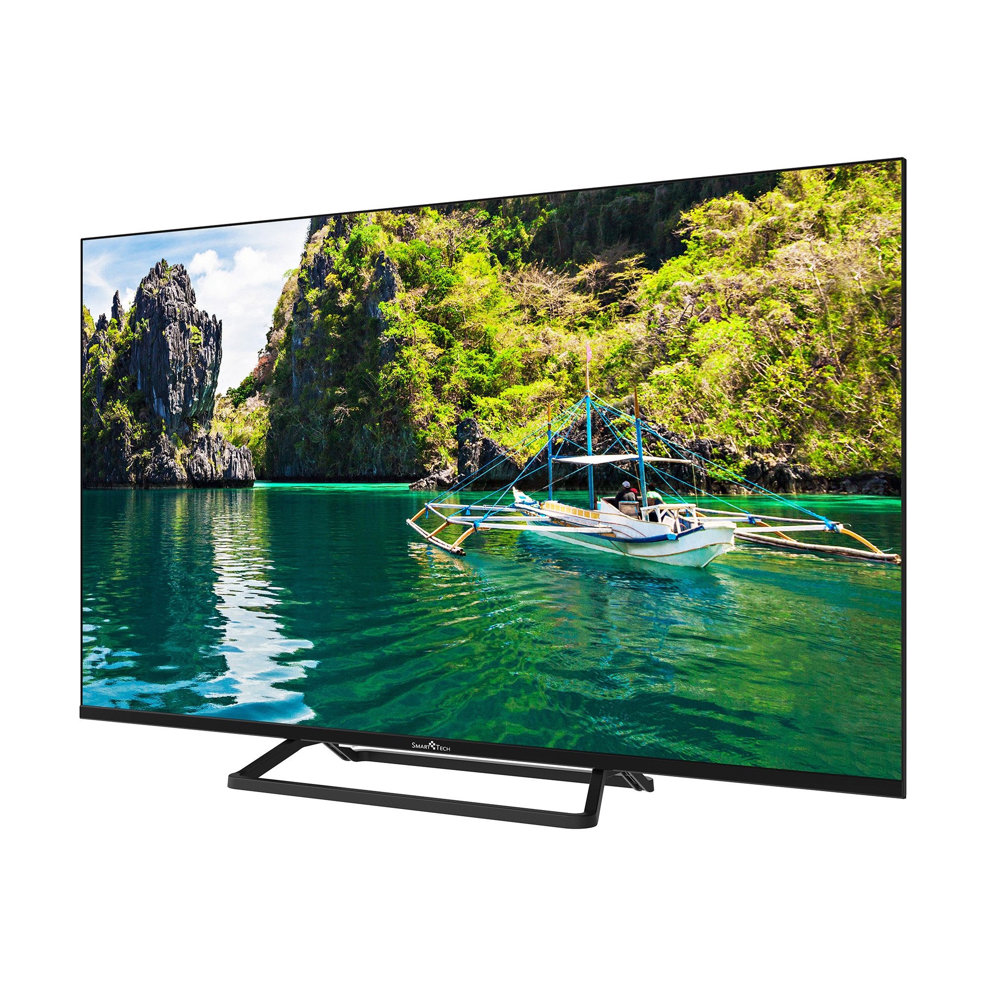 Un smart TV muestra un paisaje tropical con un bote en agua verde ante acantilados rocosos y árboles.