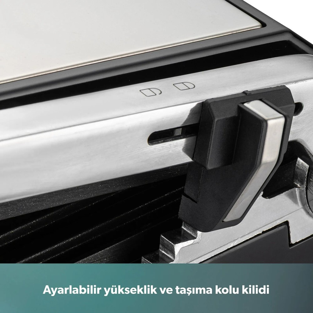 Gümüş ve siyah detaylara sahip modern bir elektrikli ızgaranın kilit mekanizmasının ve kolunun yakın planı.