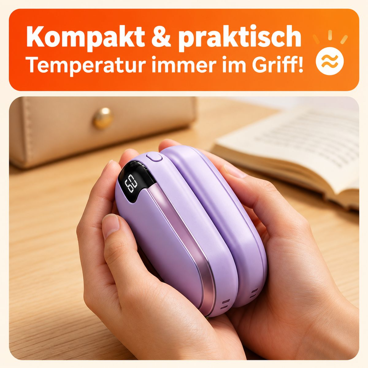 Hände halten zwei kompakte, violette Handwärmer mit digitaler Temperaturanzeige.
