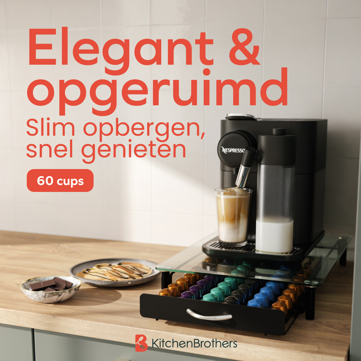 Kaffeemaschine auf Kapselhalter, daneben Teller mit Pfannkuchen und Schale mit Schokolade.