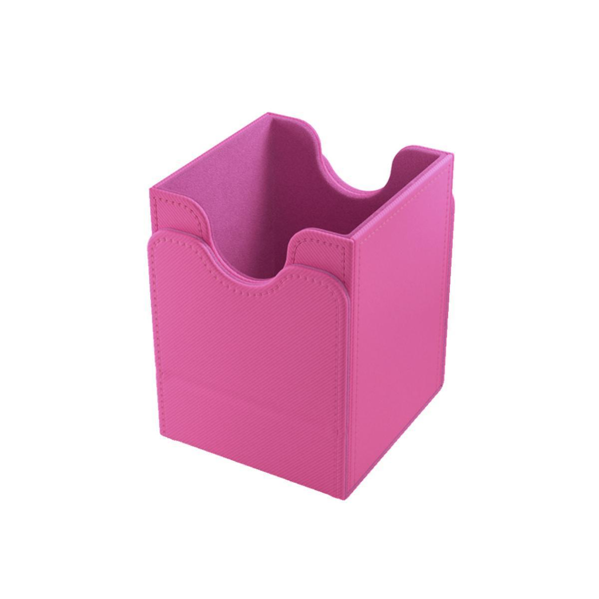 Una caja de cubierta de cuero rosa texturizado con un recorte en U sobre fondo blanco.