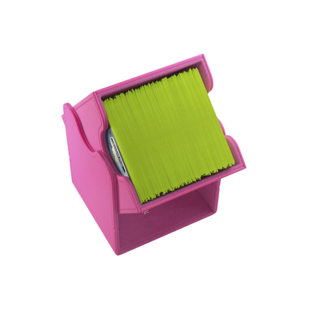 Un soporte para notas rosa lleno de notas adhesivas verde brillante sobre fondo blanco.
