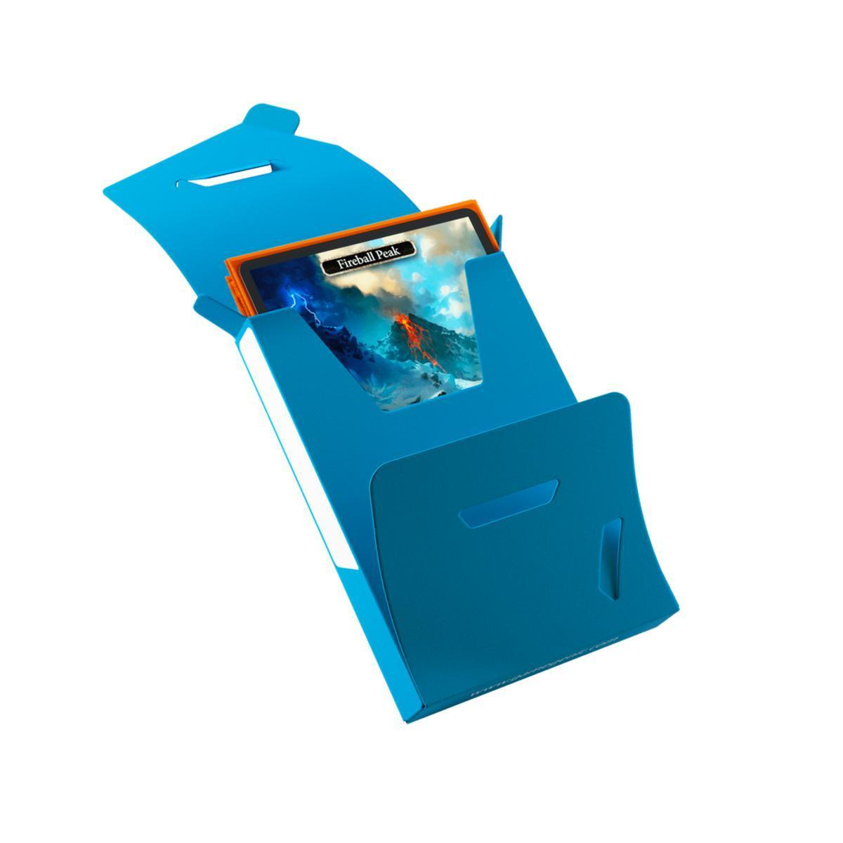 Una caja de mazo de cartón azul abierta, que revela una tarjeta coleccionable llamada Fireball Peak.