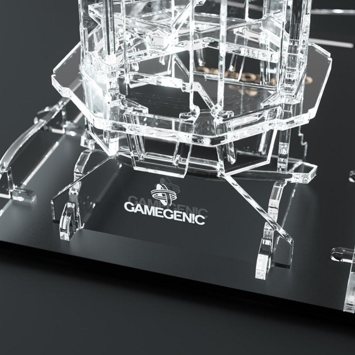 Estructura de acrílico transparente con el logo blanco de Gamegenic en una superficie negra.