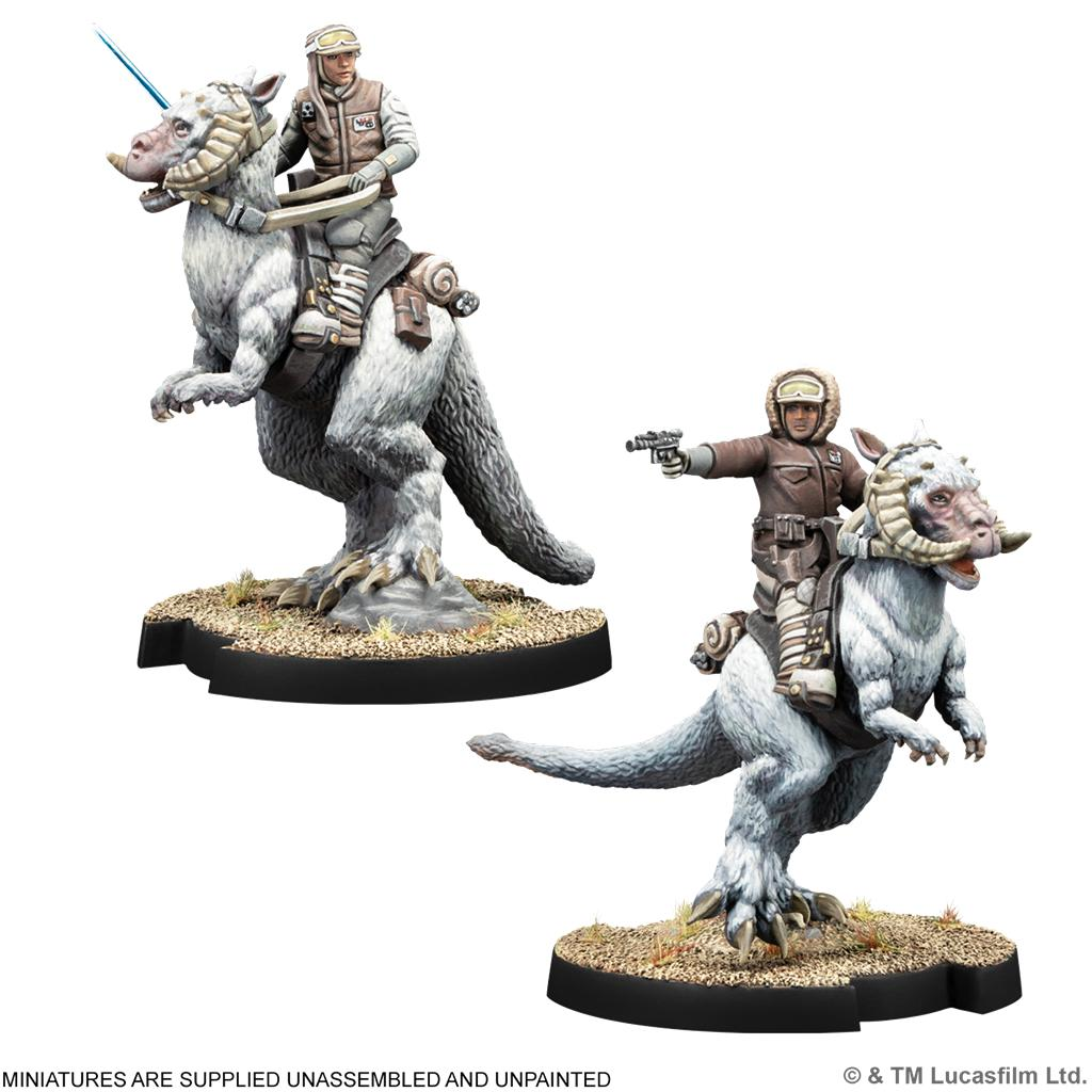Dos figuras en miniatura pintadas de soldados montando tauntauns blancos sobre bases redondas.