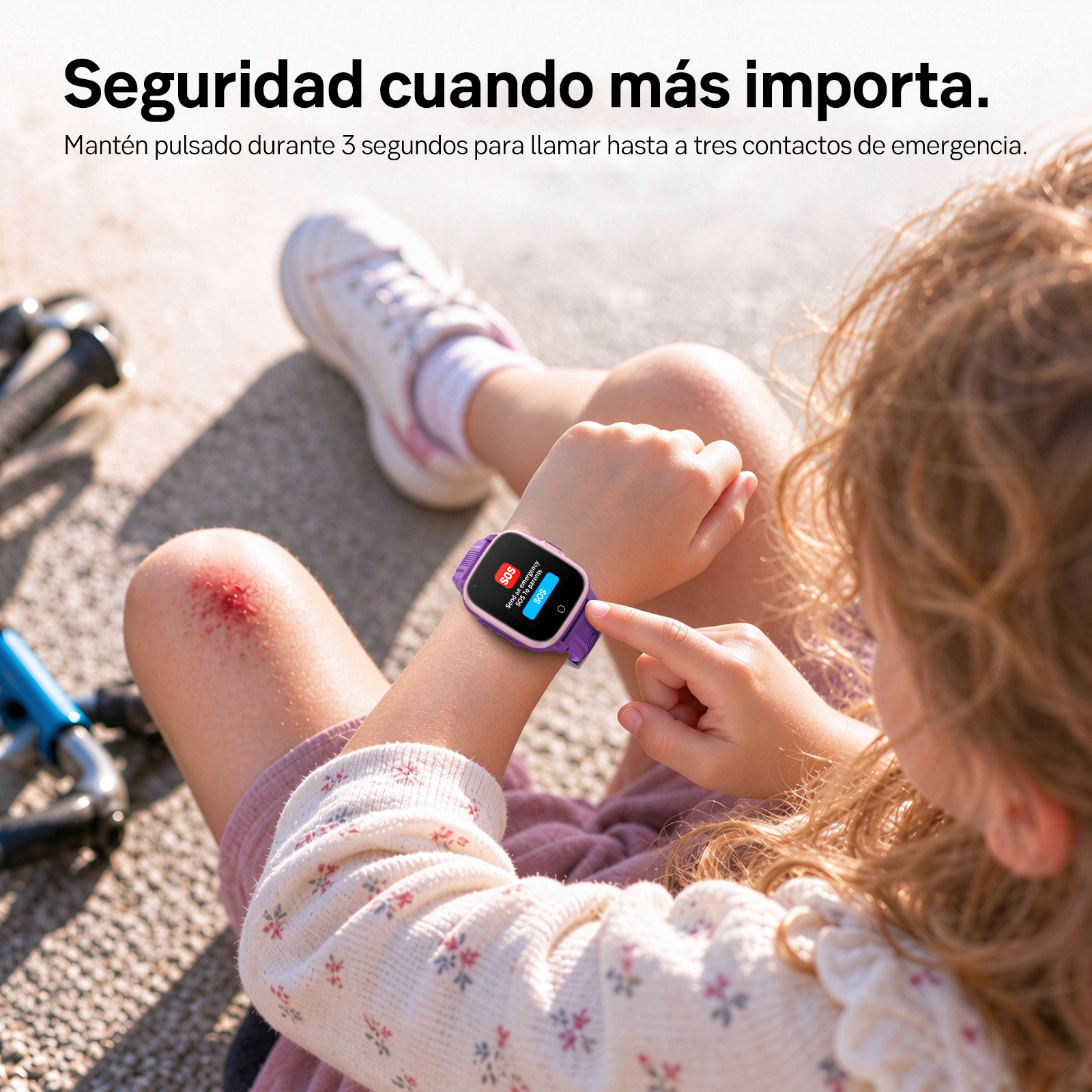 Una niña con la rodilla raspada presiona un botón SOS en su reloj inteligente.