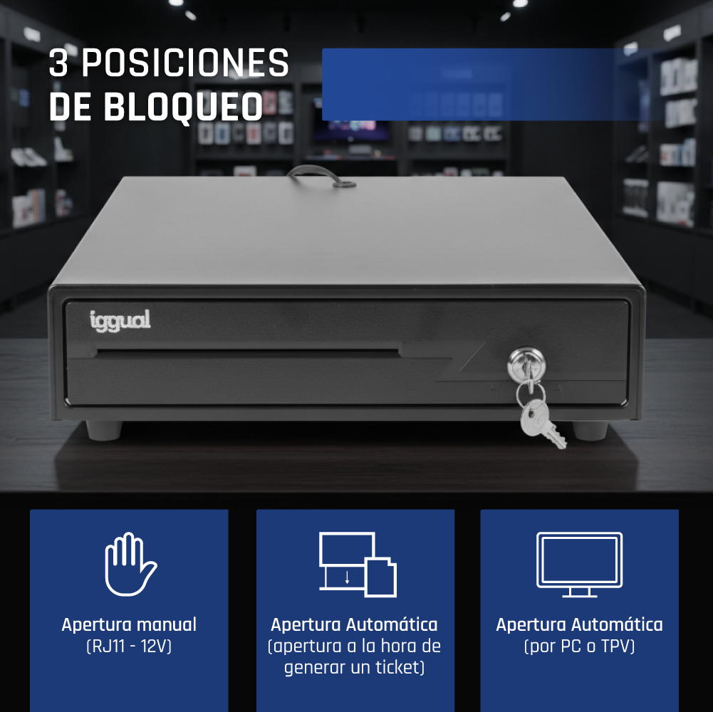 Cajón portamonedas negro sobre una mesa con tres cuadros azules abajo.