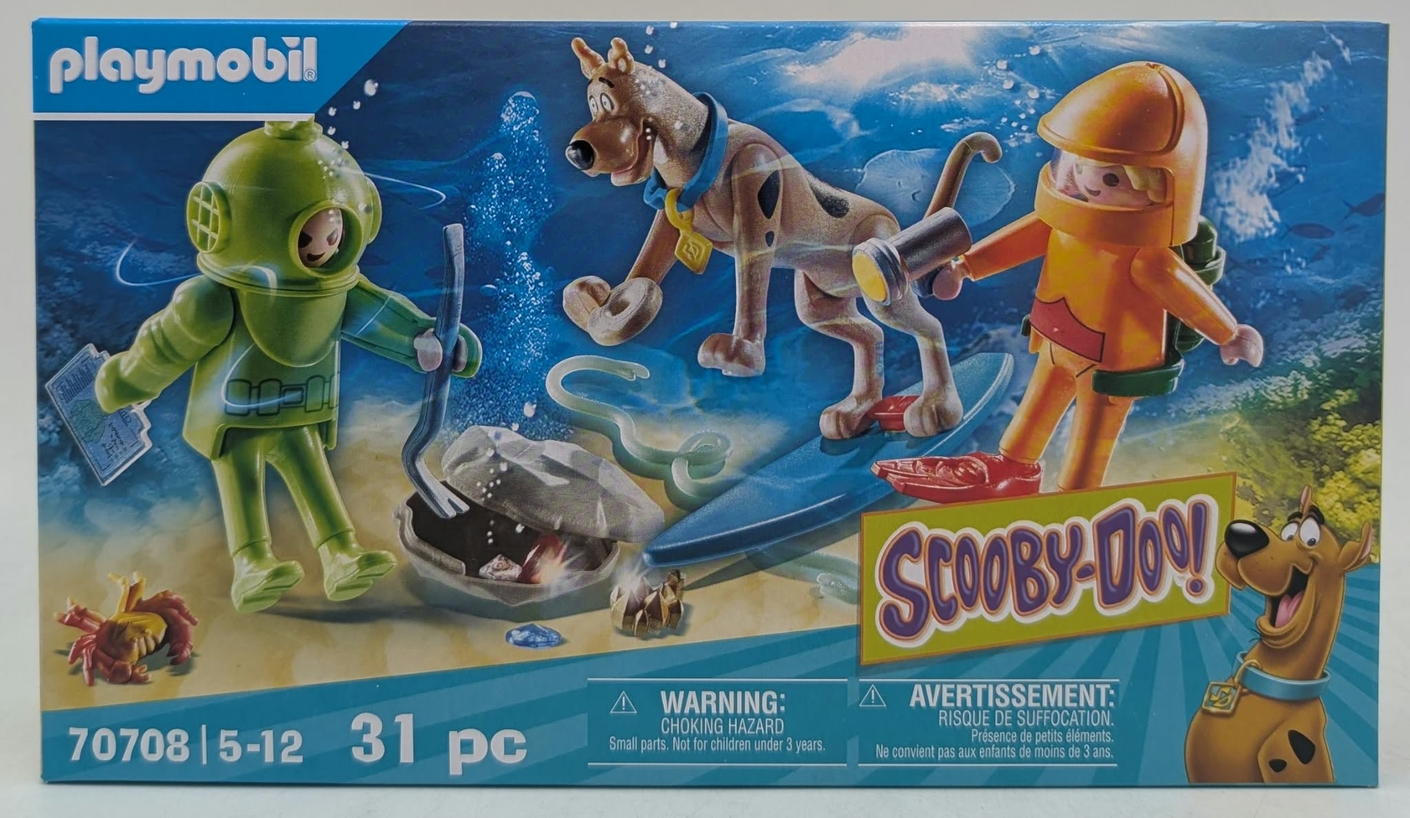 Set de juego subacuático Playmobil Scooby-Doo con figuras, Scooby-Doo en una tabla de surf y un cofre del tesoro.