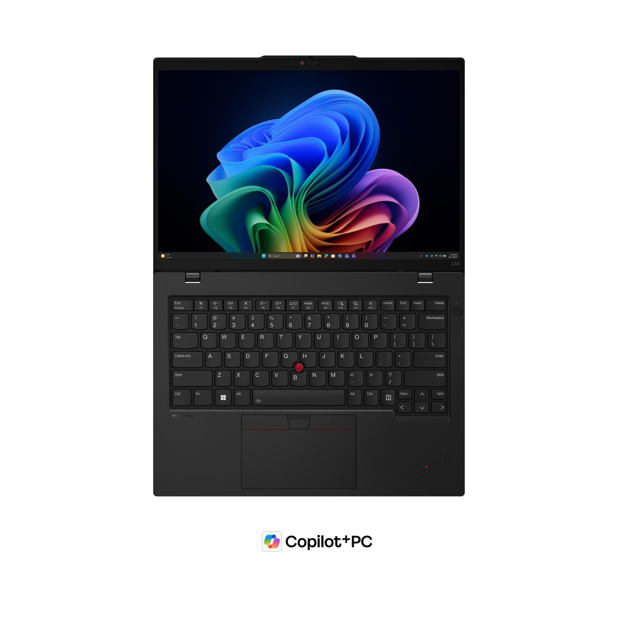 Un computer portatile nero mostra un motivo ad onde colorate sullo schermo e ha una tastiera QWERTY.