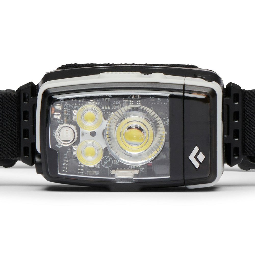 Schwarze und weiße Stirnlampe mit mehreren LEDs und schwarzem Stirnband auf weißem Grund.